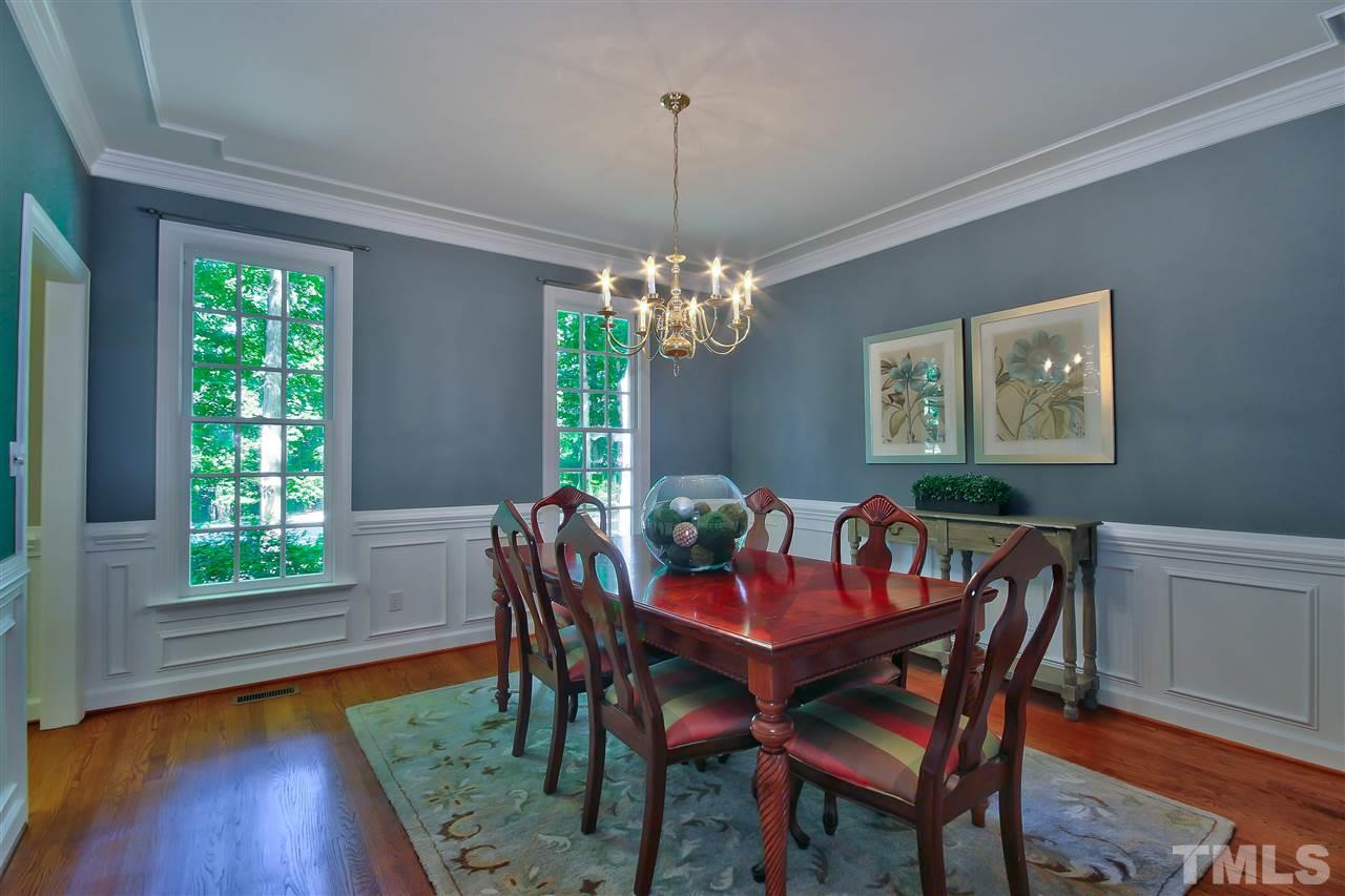 6108 Fetlock Drive Raleigh, NC 27613 - Photo 11 of 25 a view of a dining room with furniture window and wooden floor