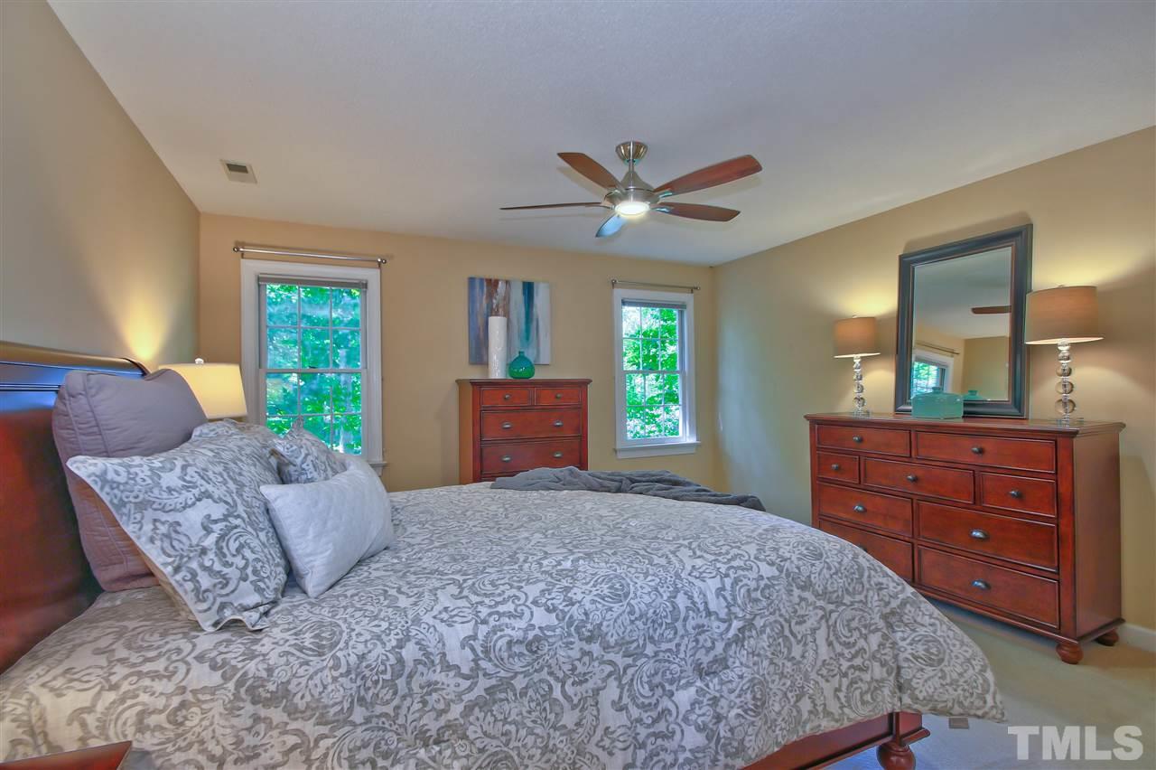 6108 Fetlock Drive Raleigh, NC 27613 - Photo 13 of 25 a living room with furniture and a window