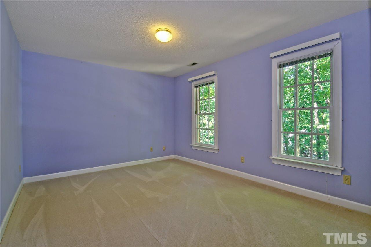 6108 Fetlock Drive Raleigh, NC 27613 - Photo 19 of 25 an empty room with windows