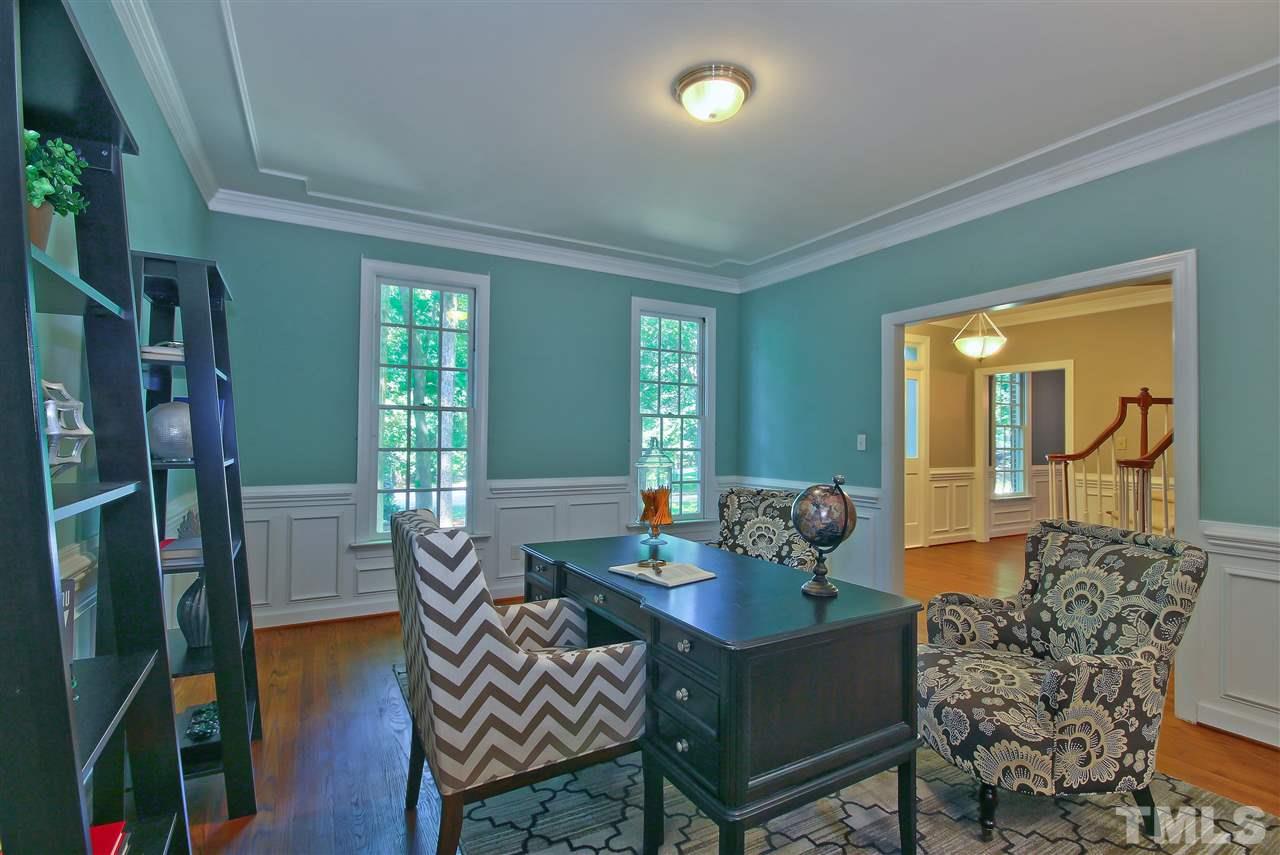 6108 Fetlock Drive Raleigh, NC 27613 - Photo 5 of 25 a dining room with furniture and wooden floor