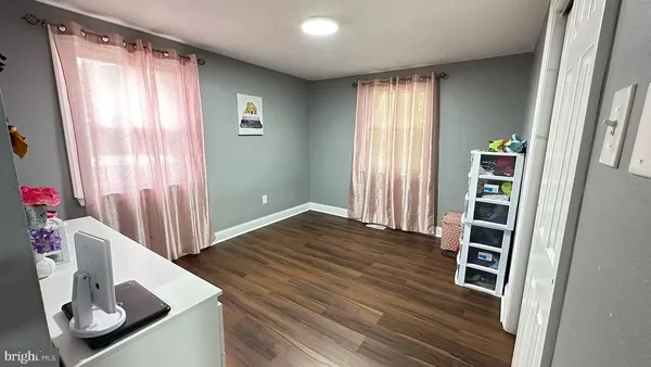 a view of a livingroom with furniture and window