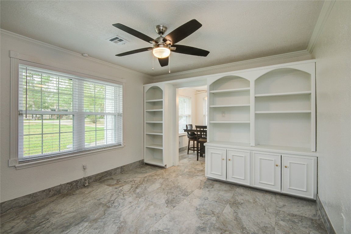 25910 Maplewood Drive Spring, TX 77386 - Photo 22 of 50 a view of an empty room with a window