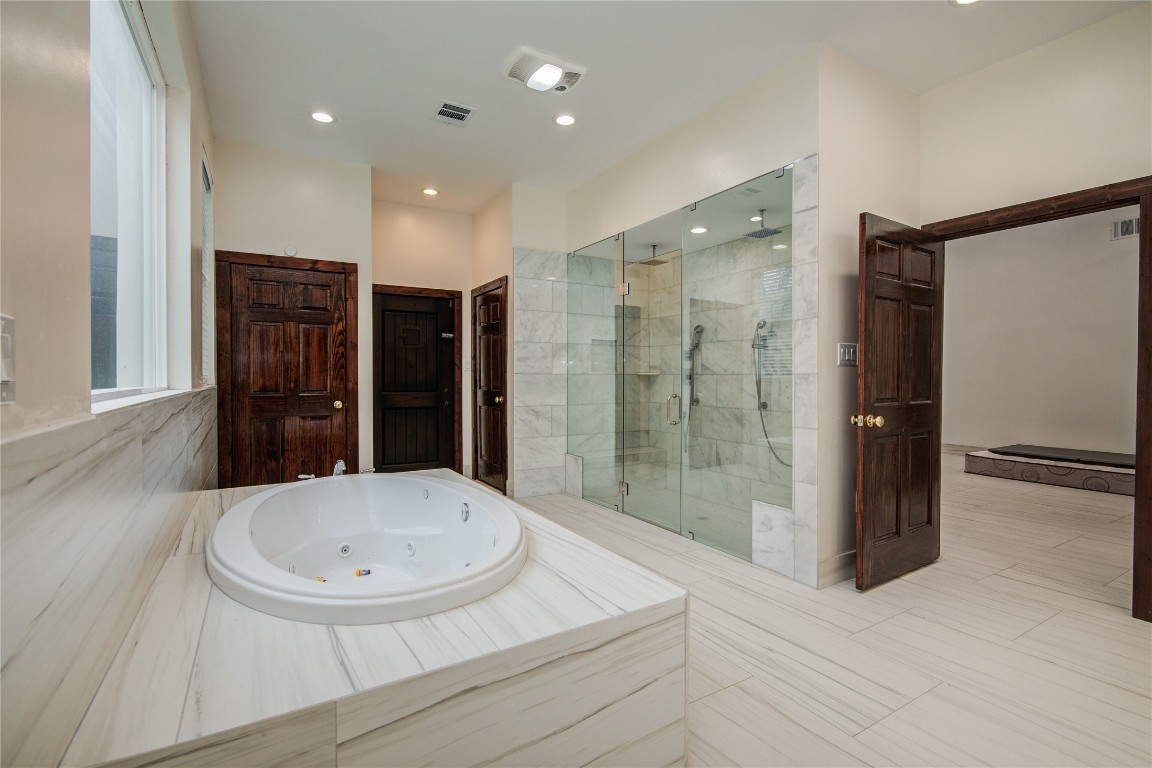 25910 Maplewood Drive Spring, TX 77386 - Photo 25 of 50 a bathroom with a shower and a sink