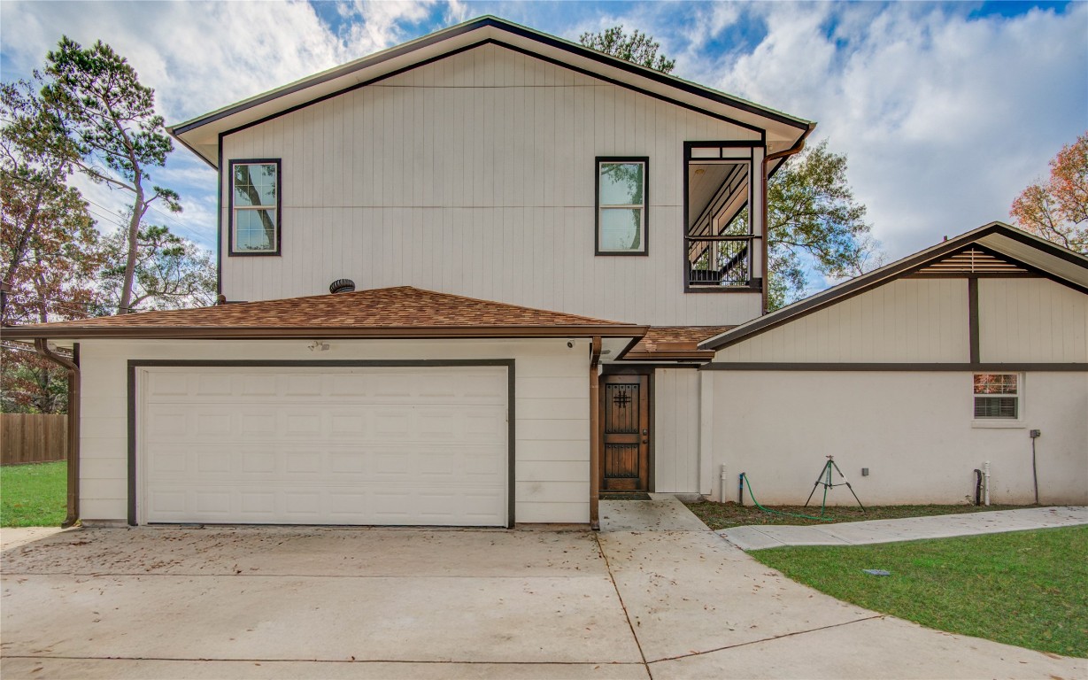 25910 Maplewood Drive Spring, TX 77386 - Photo 7 of 50 a front view of a house with a yard and garage