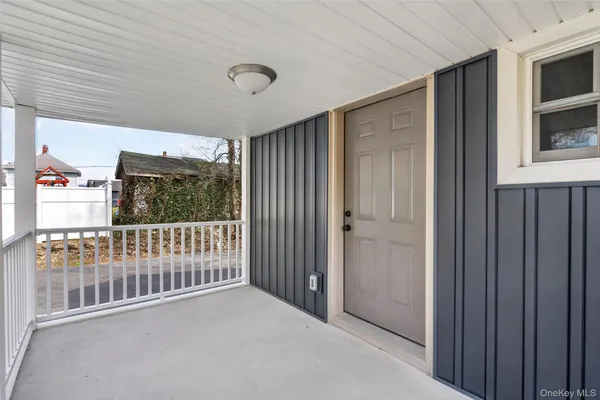 a view of a hallway with windows