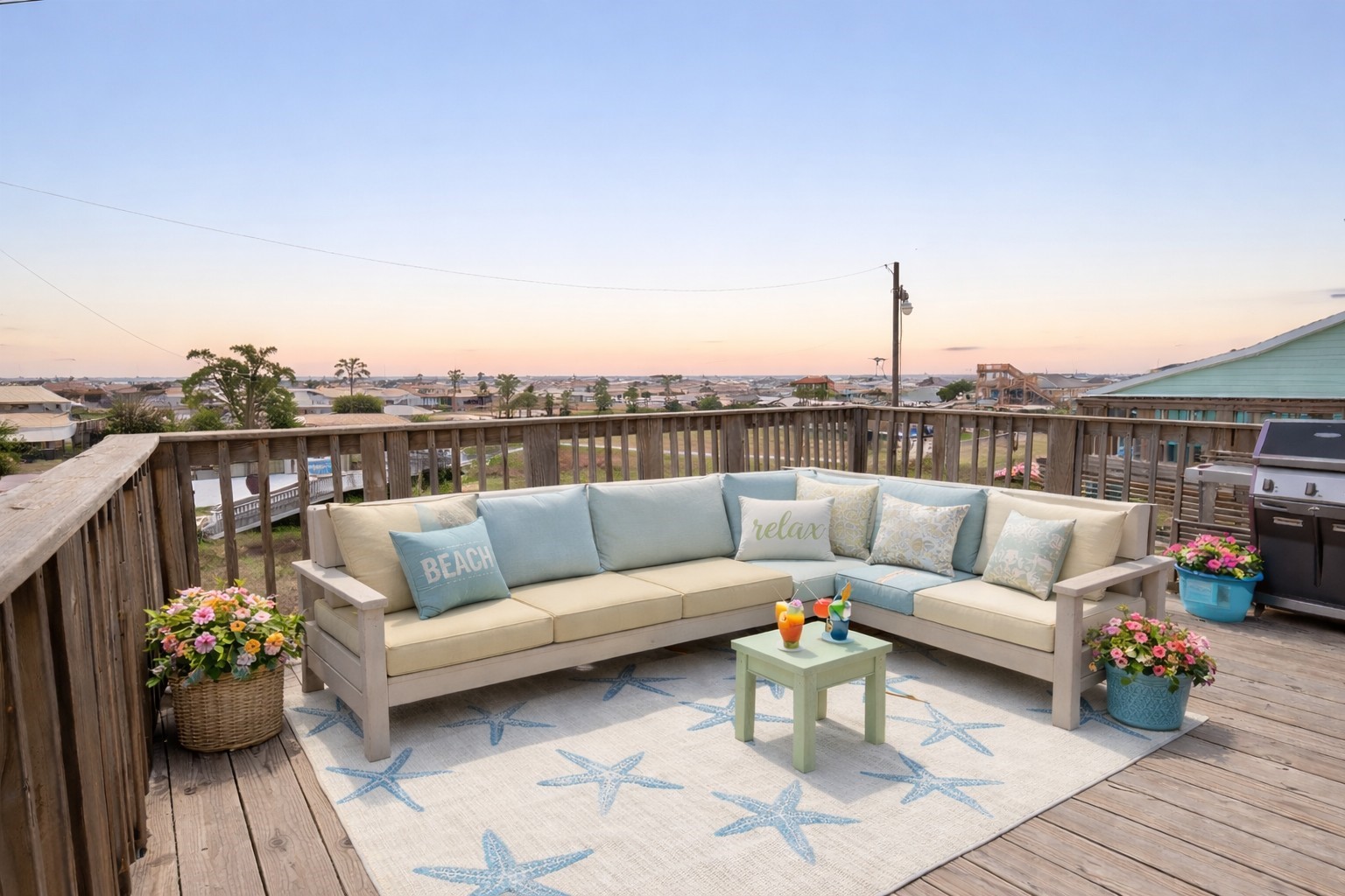 Enjoy this beautiful sunset on the deck while firing up the grill for a seaside BBQ! *Virtually Staged*