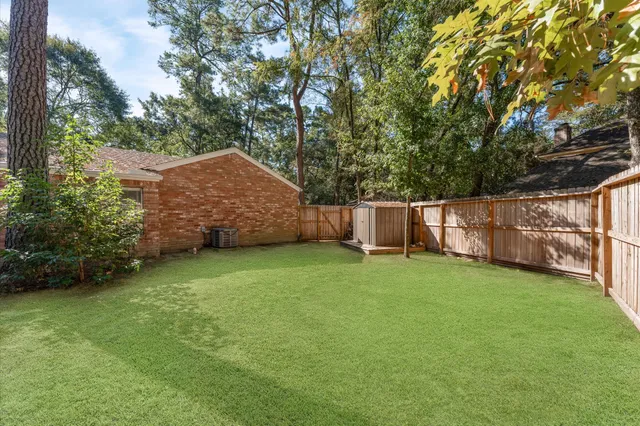 $449,000 | 33 Crystal Lake Lane, The Woodlands, TX 77380