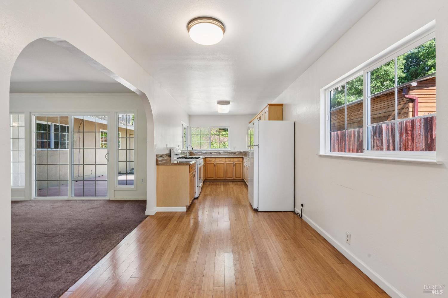 546 Pinewood Drive San Rafael, CA 94903 - Photo 13 of 52 a view of a kitchen with wooden floor and a window