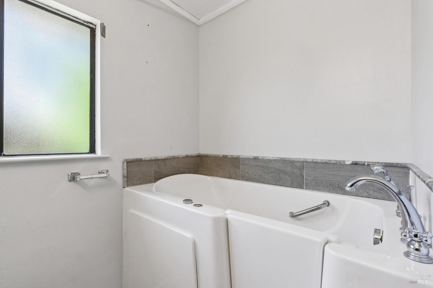546 Pinewood Drive San Rafael, CA 94903 - Photo 32 of 52 a bathroom with a sink and a bathtub