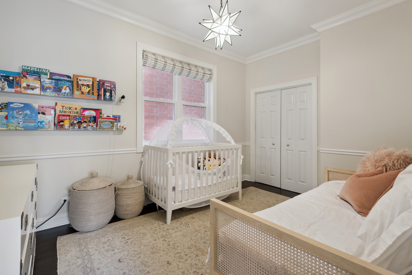 1327 West Roscoe Street, Unit 2 Chicago, IL 60657 - Photo 13 of 32 a bedroom with a bed and a window