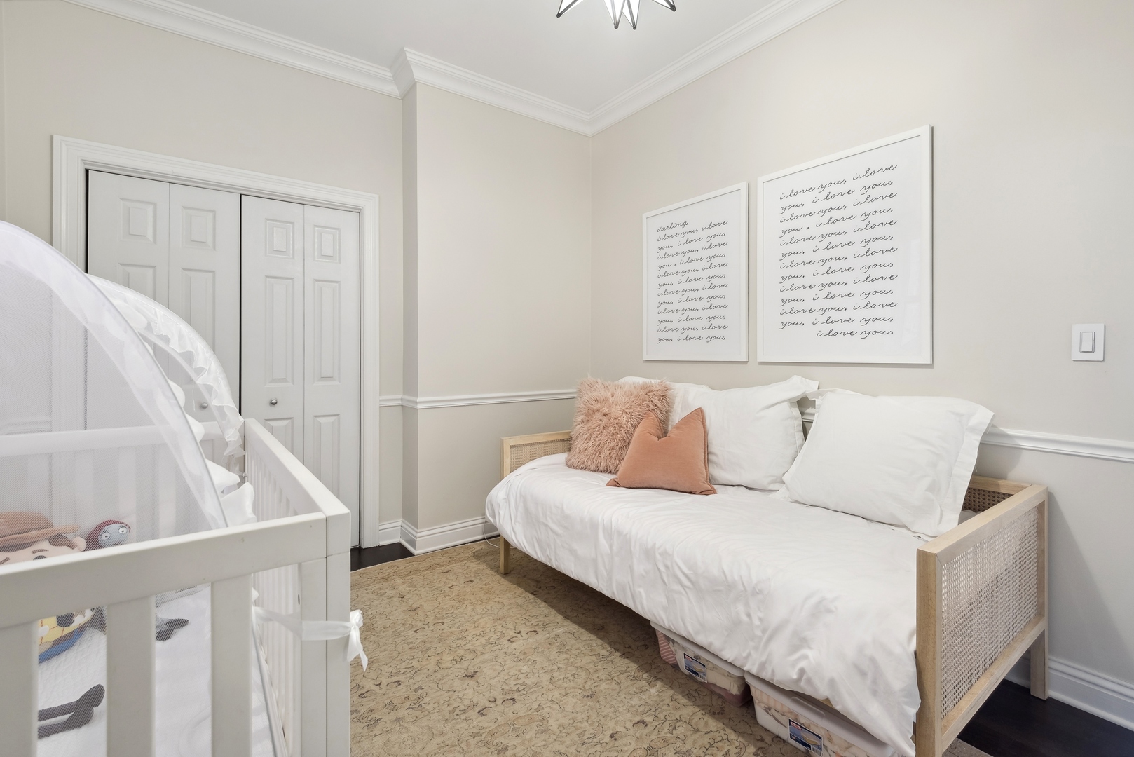 1327 West Roscoe Street, Unit 2 Chicago, IL 60657 - Photo 14 of 32 a living room with furniture and a book shelf