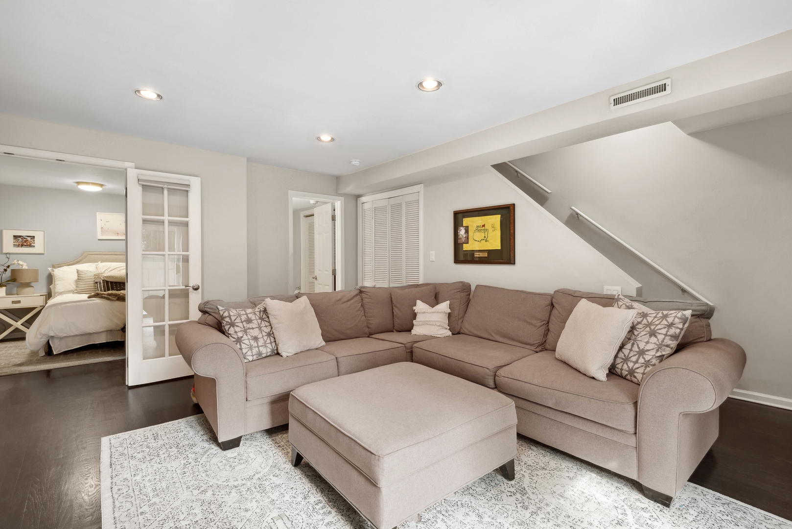 1327 West Roscoe Street, Unit 2 Chicago, IL 60657 - Photo 18 of 32 a living room with furniture and a couch