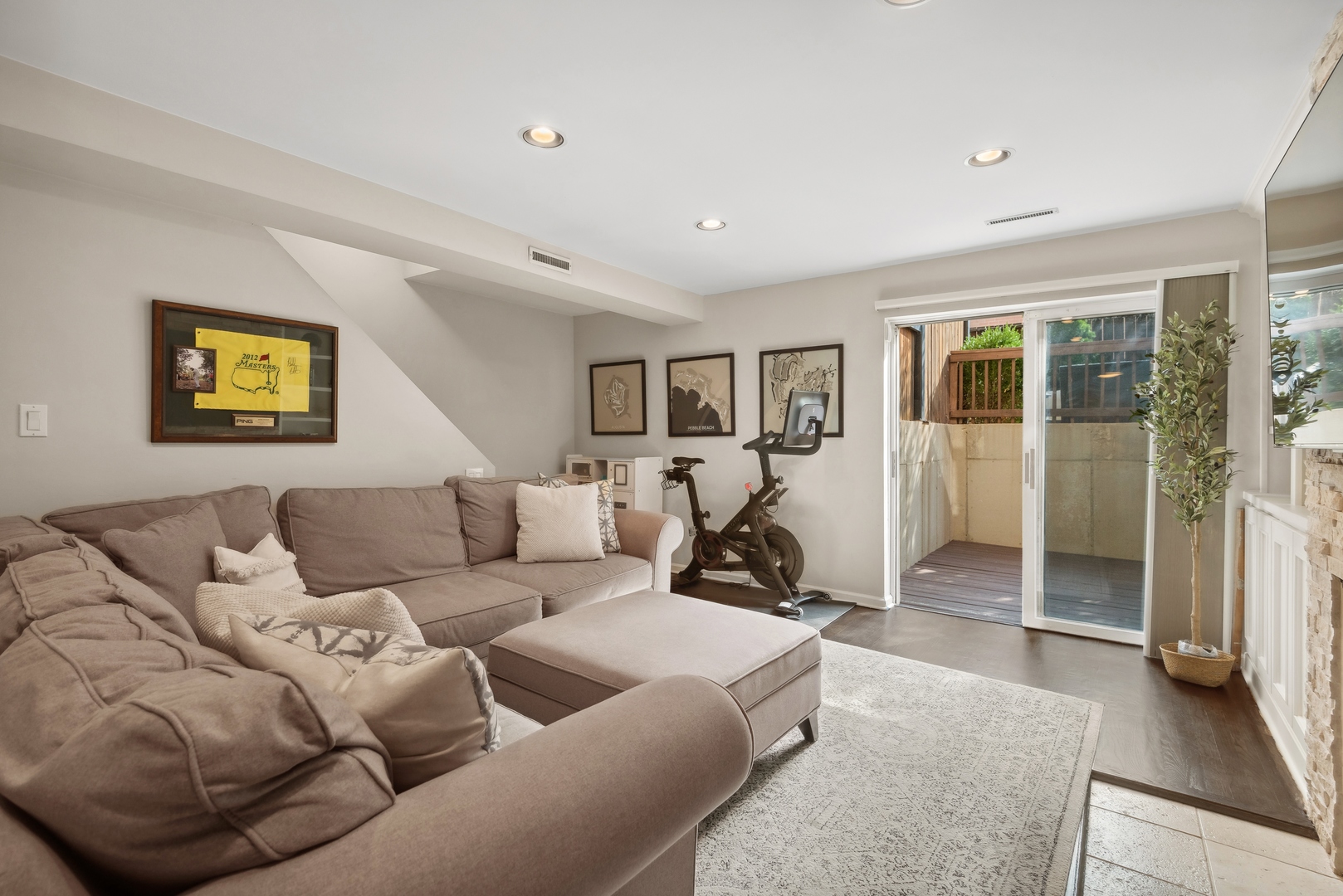 1327 West Roscoe Street, Unit 2 Chicago, IL 60657 - Photo 21 of 32 a living room with furniture and a glass door