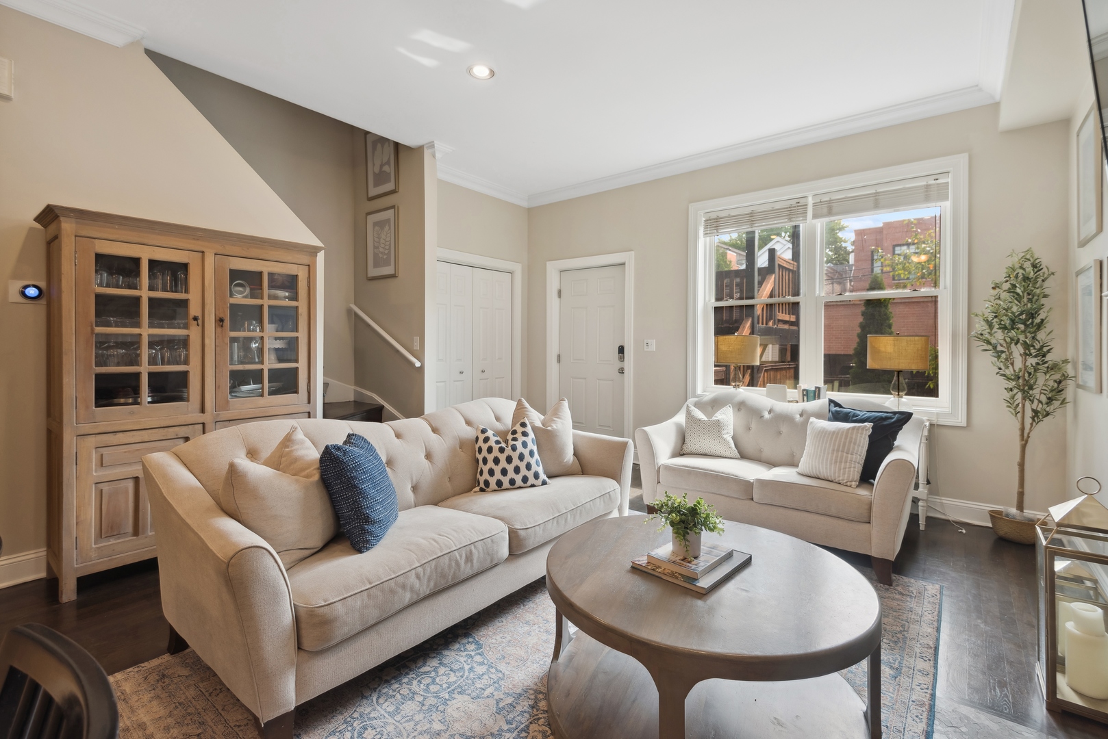 1327 West Roscoe Street, Unit 2 Chicago, IL 60657 - Photo 4 of 32 a living room with furniture and a large window