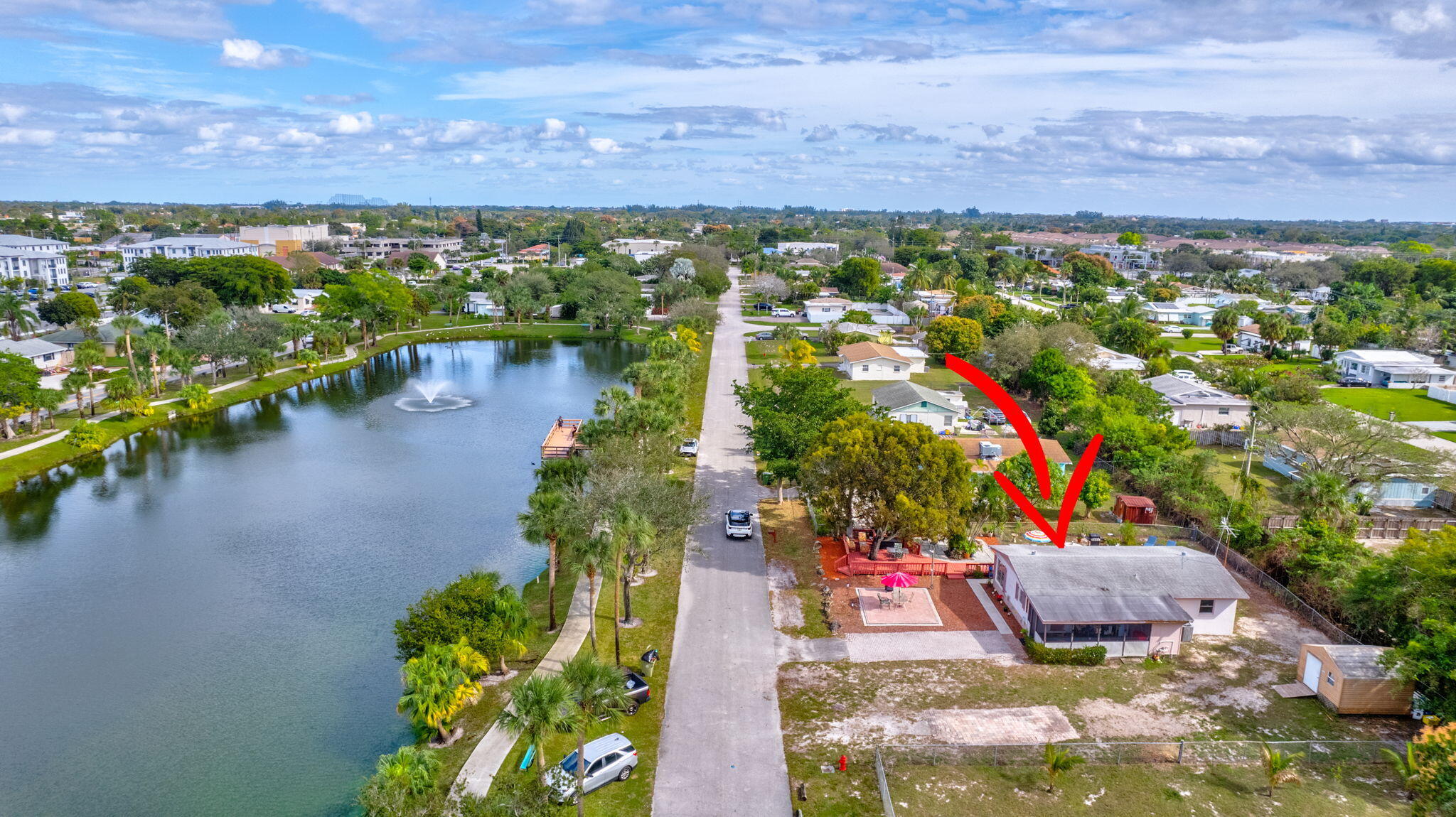 3208 Thelma Road Palm Springs, FL 33406 - Photo 1 of 79 75-web-or-mls-DJI_0647AA