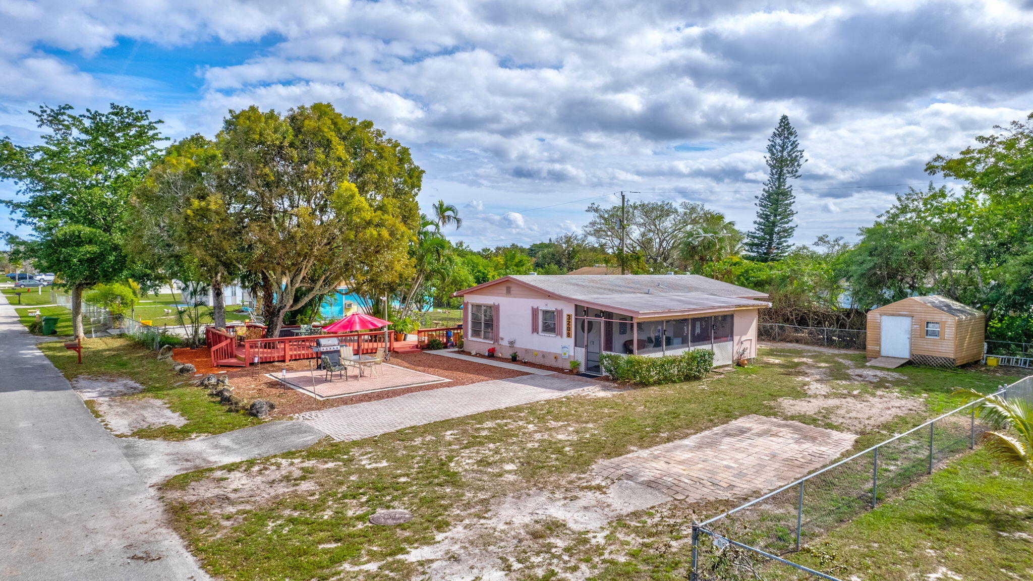 3208 Thelma Road Palm Springs, FL 33406 - Photo 53 of 79 52-web-or-mls-DJI_0532AA