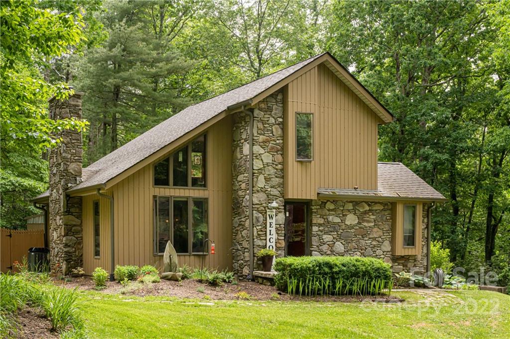 29 Spring Lane Fairview, NC 28730 - Photo 1 of 43 a front view of house with yard