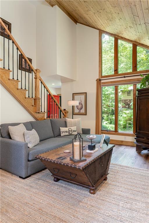 29 Spring Lane Fairview, NC 28730 - Photo 11 of 43 a living room with furniture and a table