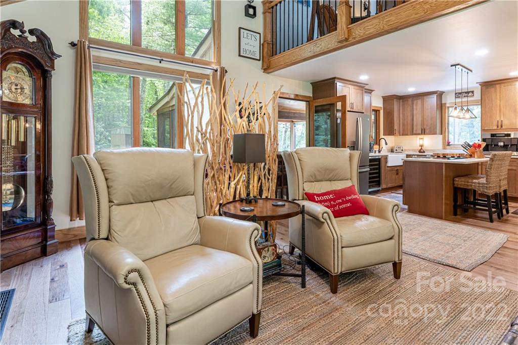29 Spring Lane Fairview, NC 28730 - Photo 9 of 43 a living room with furniture and a large window