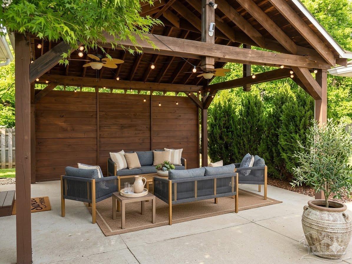 3055 Wallace Lake Road Pace, FL 32571 - Photo 3 of 33 a view of an outdoor space with seating area