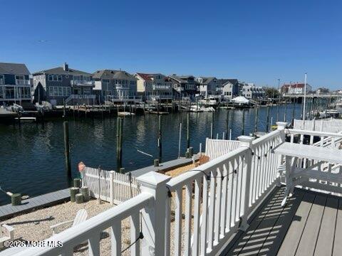 119 Randall Avenue, Unit A Point Pleasant Beach, NJ 08742 - Photo 2 of 27 a balcony with view of city and a lake