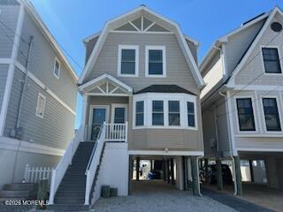 119 Randall Avenue, Unit A Point Pleasant Beach, NJ 08742 - Photo 27 of 27 a front view of a house with a porch