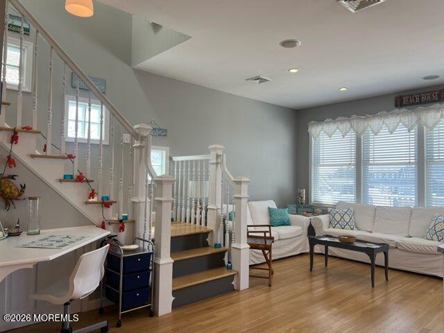 119 Randall Avenue, Unit A Point Pleasant Beach, NJ 08742 - Photo 4 of 27 a living room with furniture and a wooden floor
