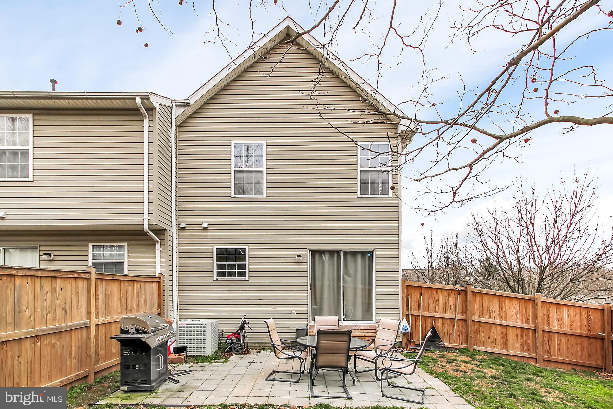 8700 Jarwood Road Baltimore, MD 21237 - Photo 21 of 22 Quaint Backyard With New Patio