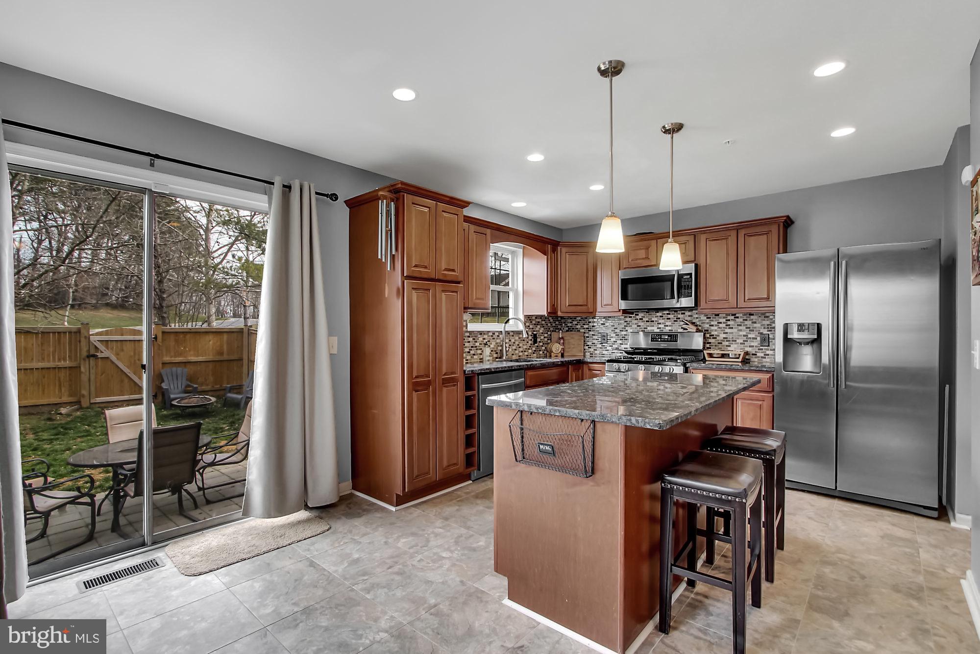 8700 Jarwood Road Baltimore, MD 21237 - Photo 6 of 22 Spacious Kitchen with access to the backyard