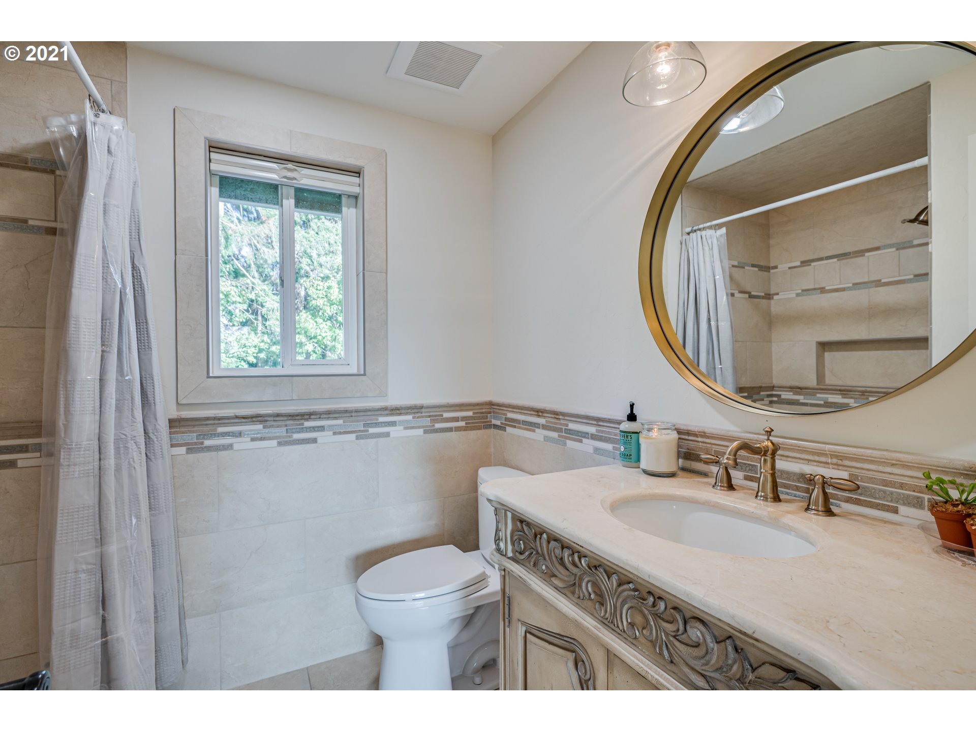 29010 Northwest 2nd Avenue Ridgefield, WA 98642 - Photo 22 of 32 a bathroom with a granite countertop sink mirror vanity and toilet