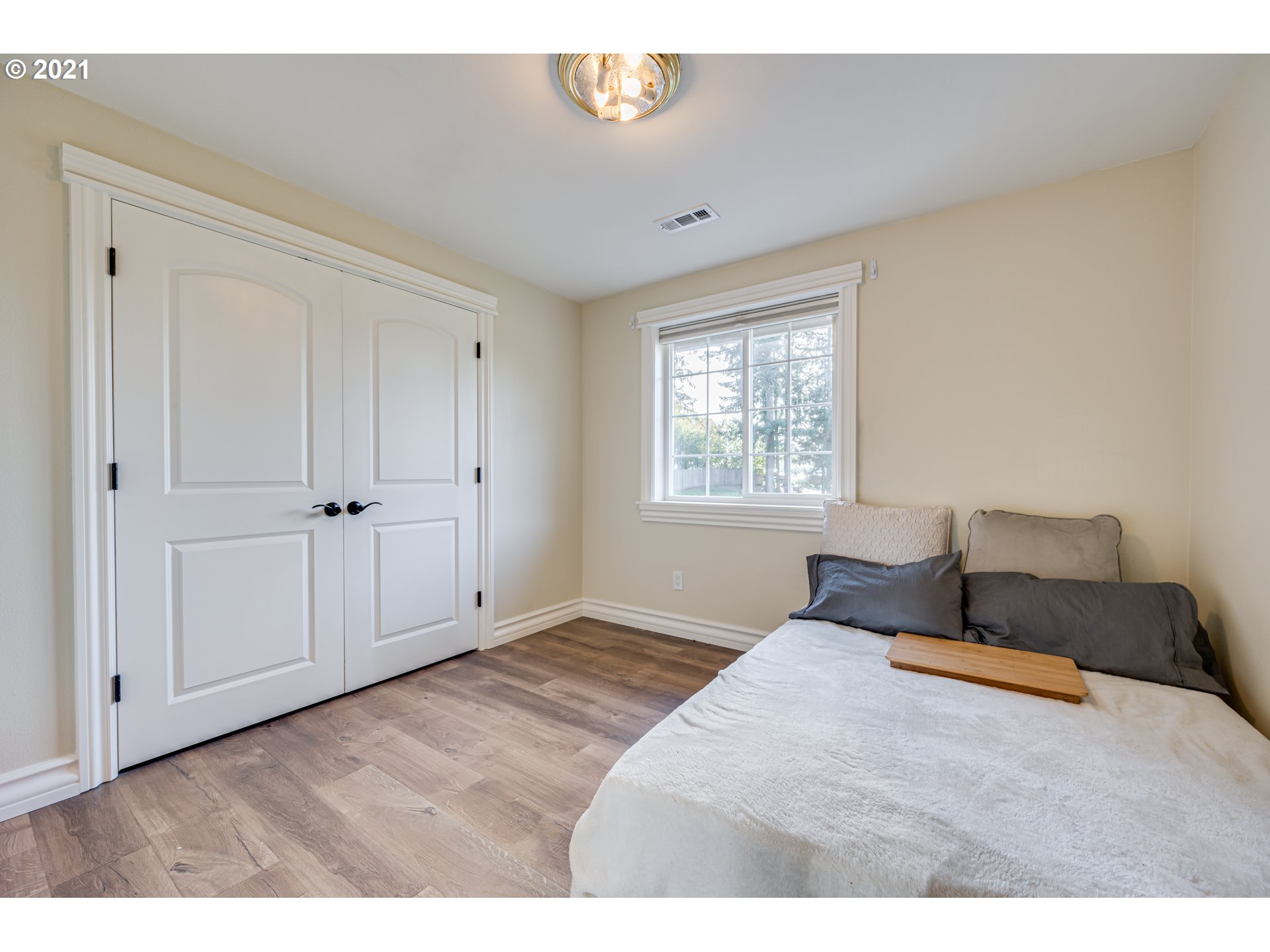 29010 Northwest 2nd Avenue Ridgefield, WA 98642 - Photo 24 of 32 a bedroom with a bed and a window