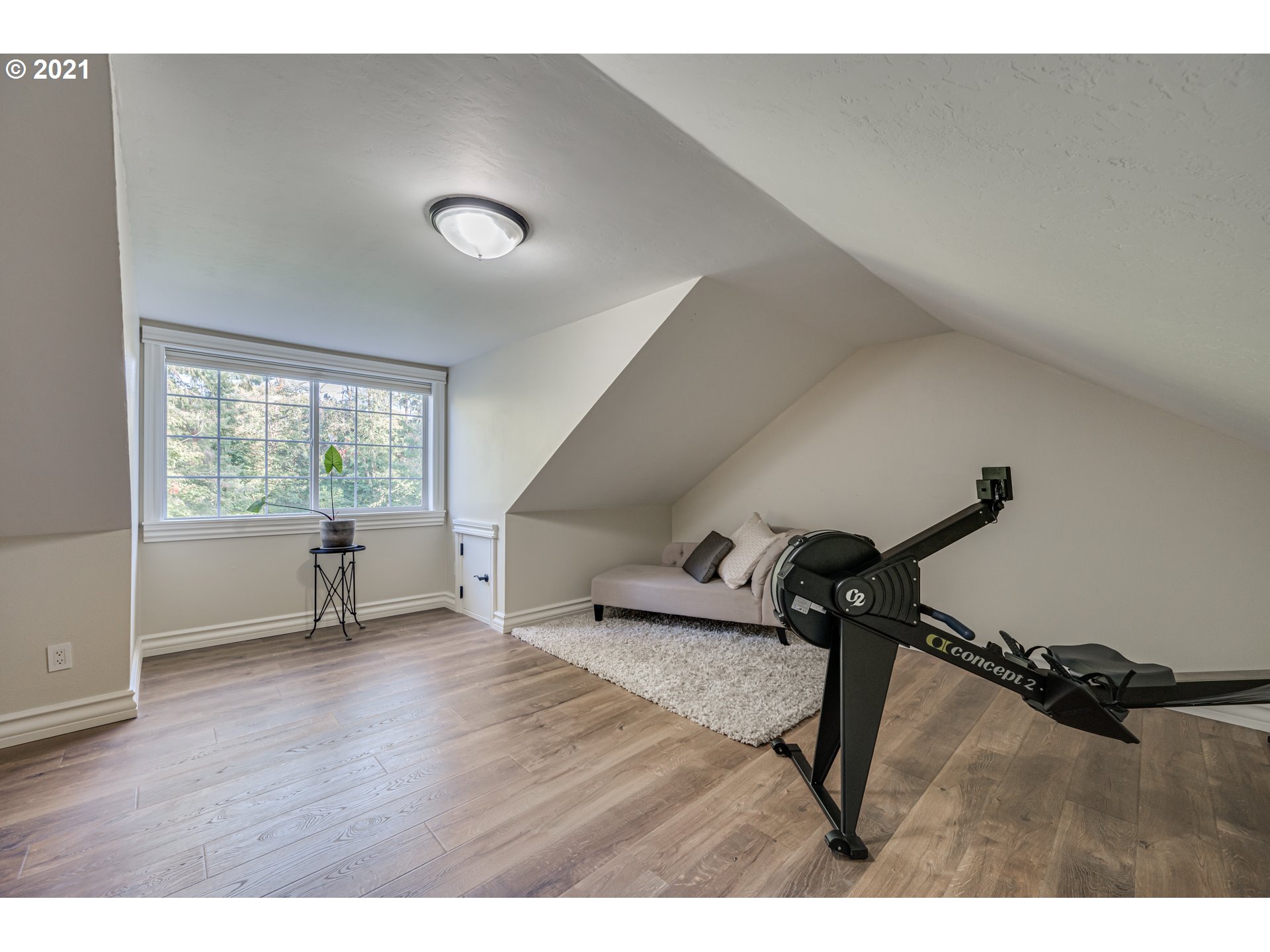 29010 Northwest 2nd Avenue Ridgefield, WA 98642 - Photo 26 of 32 a room with gym equipment and a wooden floor