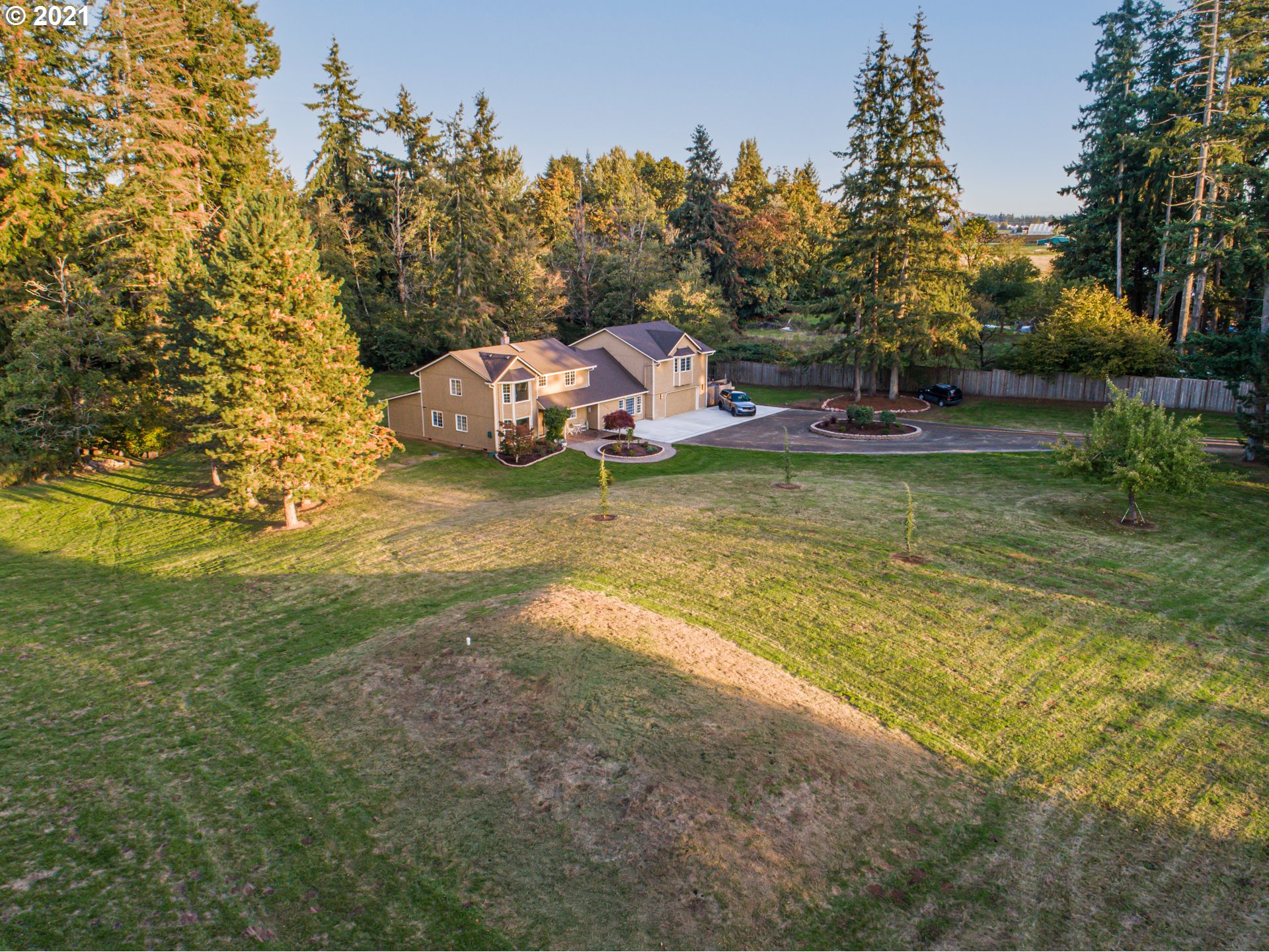 29010 Northwest 2nd Avenue Ridgefield, WA 98642 - Photo 28 of 32 a backyard of a house with a yard and outdoor seating