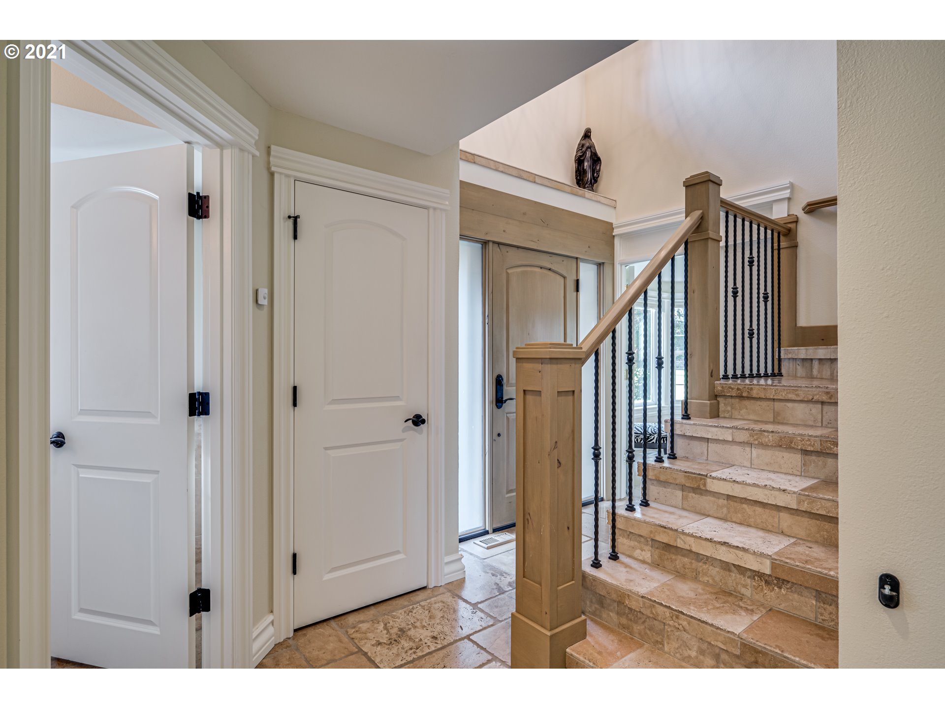 29010 Northwest 2nd Avenue Ridgefield, WA 98642 - Photo 5 of 32 a view of a hallway with wooden floor and staircase