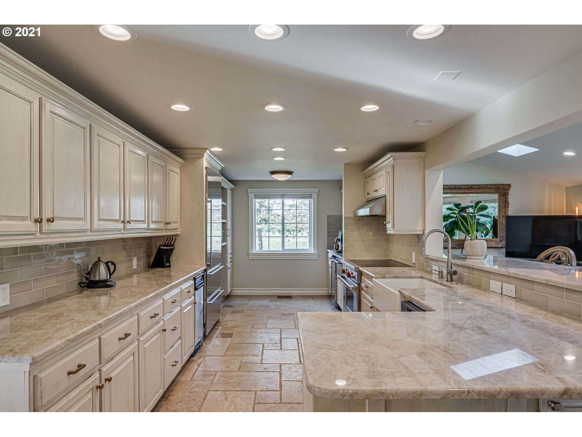 29010 Northwest 2nd Avenue Ridgefield, WA 98642 - Photo 10 of 32 a kitchen with granite countertop a sink cabinets and window