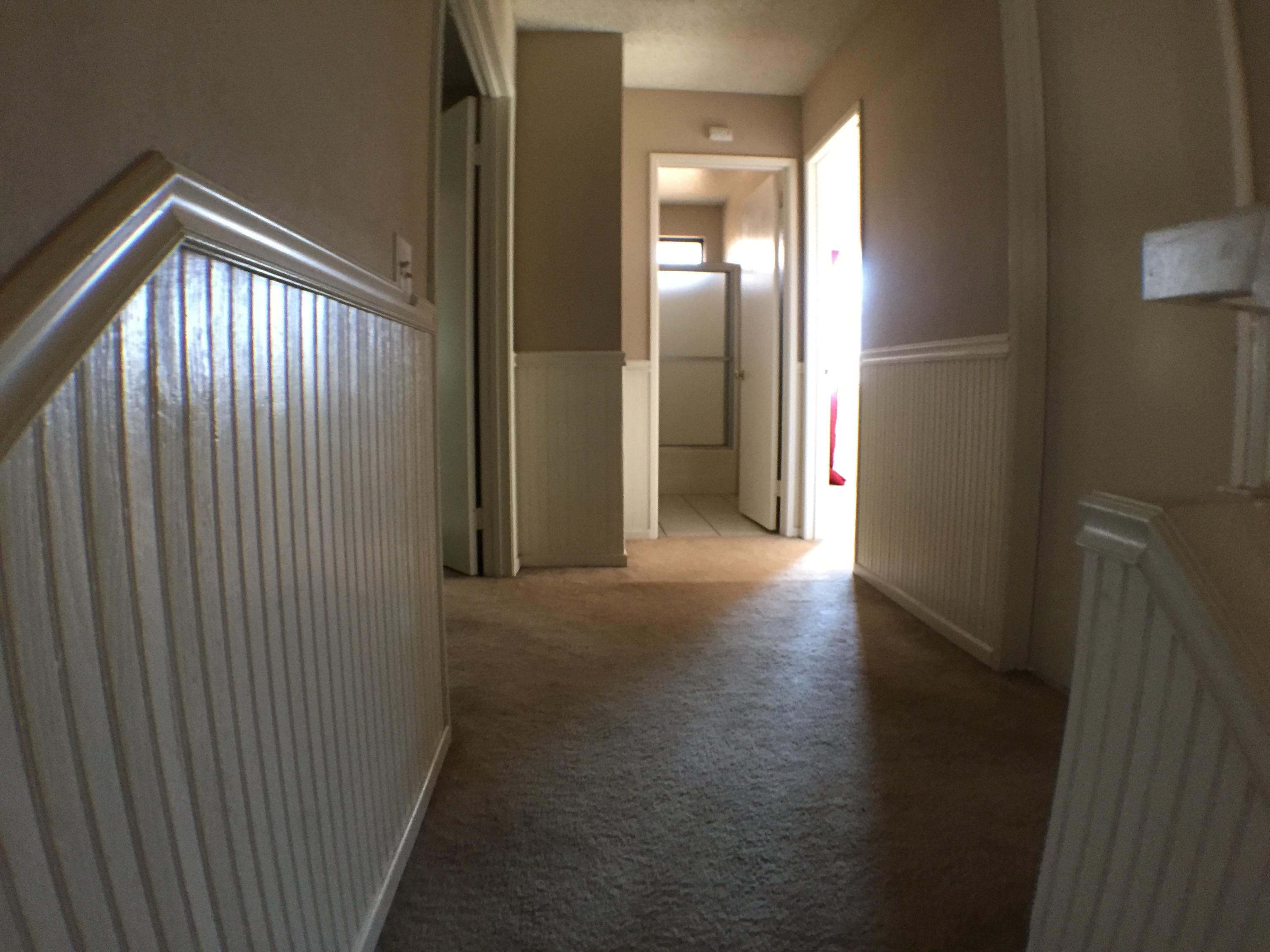 44020 Ruthron Avenue Lancaster, CA 93536 - Photo 13 of 22 Top of Stairs Wainscoting