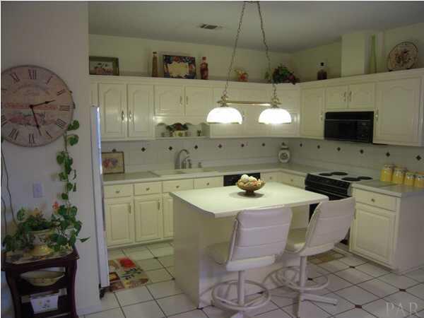 625 Copper Ridge Drive Cantonment, FL 32533 - Photo 8 of 17 Island Breakfast Bar in Kitchen
