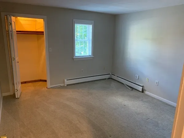 an empty room with a window