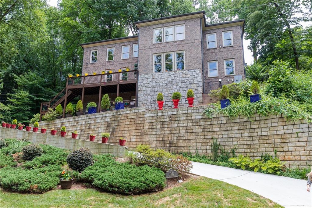1236 East Beechwood Drive Northwest Atlanta, GA 30327 - Photo 1 of 1 a view of house with outdoor space