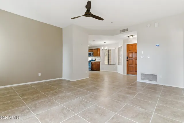 a view of a livingroom with a kitchen