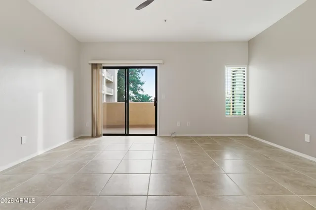 an empty room with windows