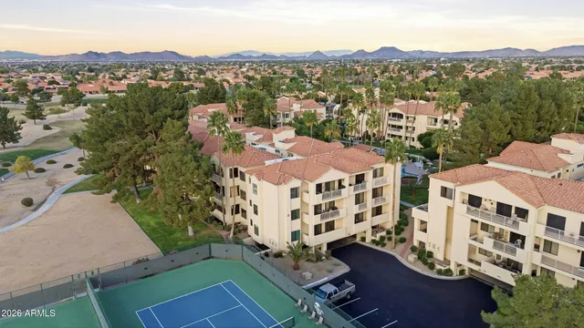 an aerial view of a house with a garden