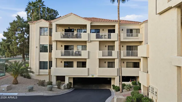 a front view of a building with a street
