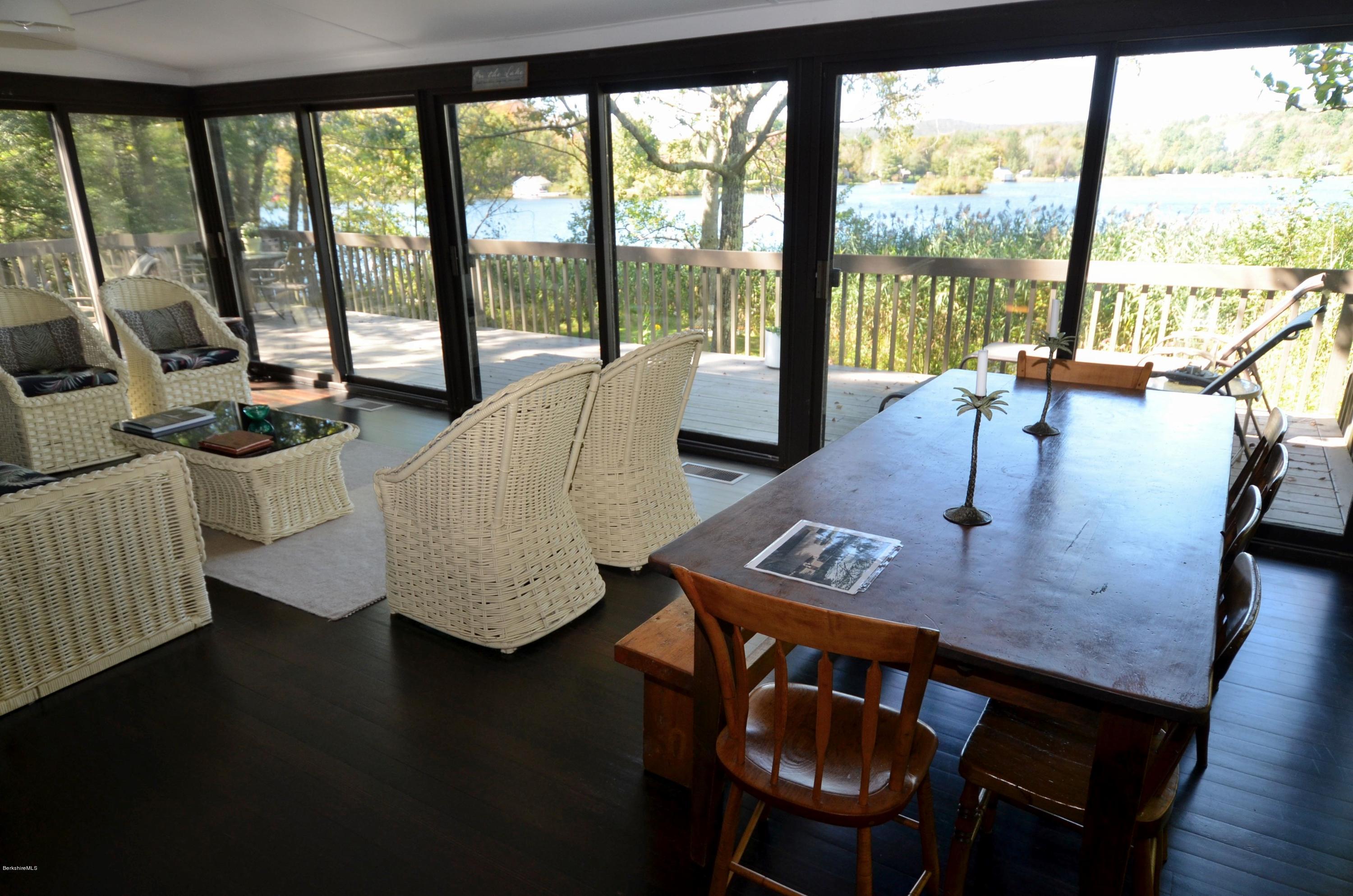 16 Point Road Monterey, MA 01245 - Photo 13 of 18 a view of a dining room with furniture window and outside view