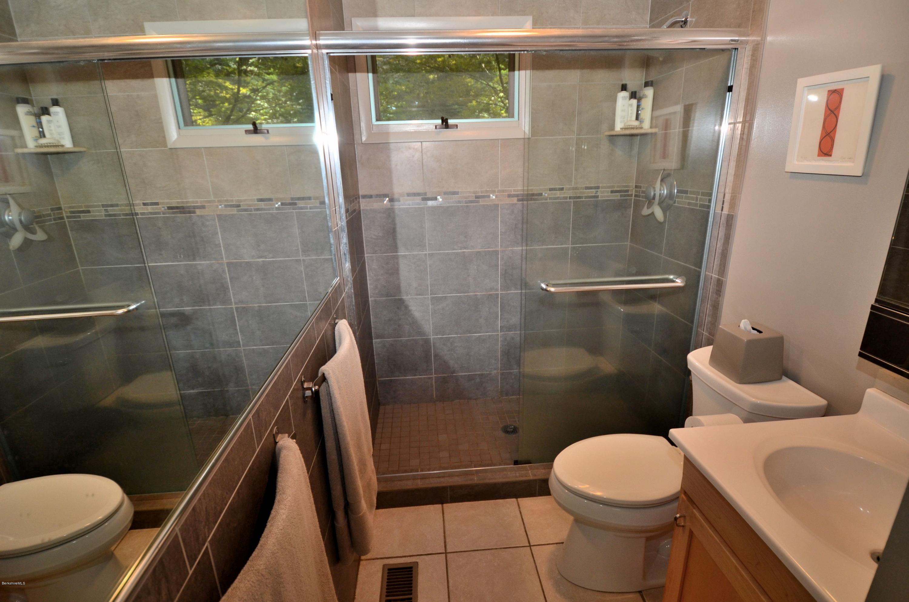 16 Point Road Monterey, MA 01245 - Photo 16 of 18 a bathroom with a toilet and a shower