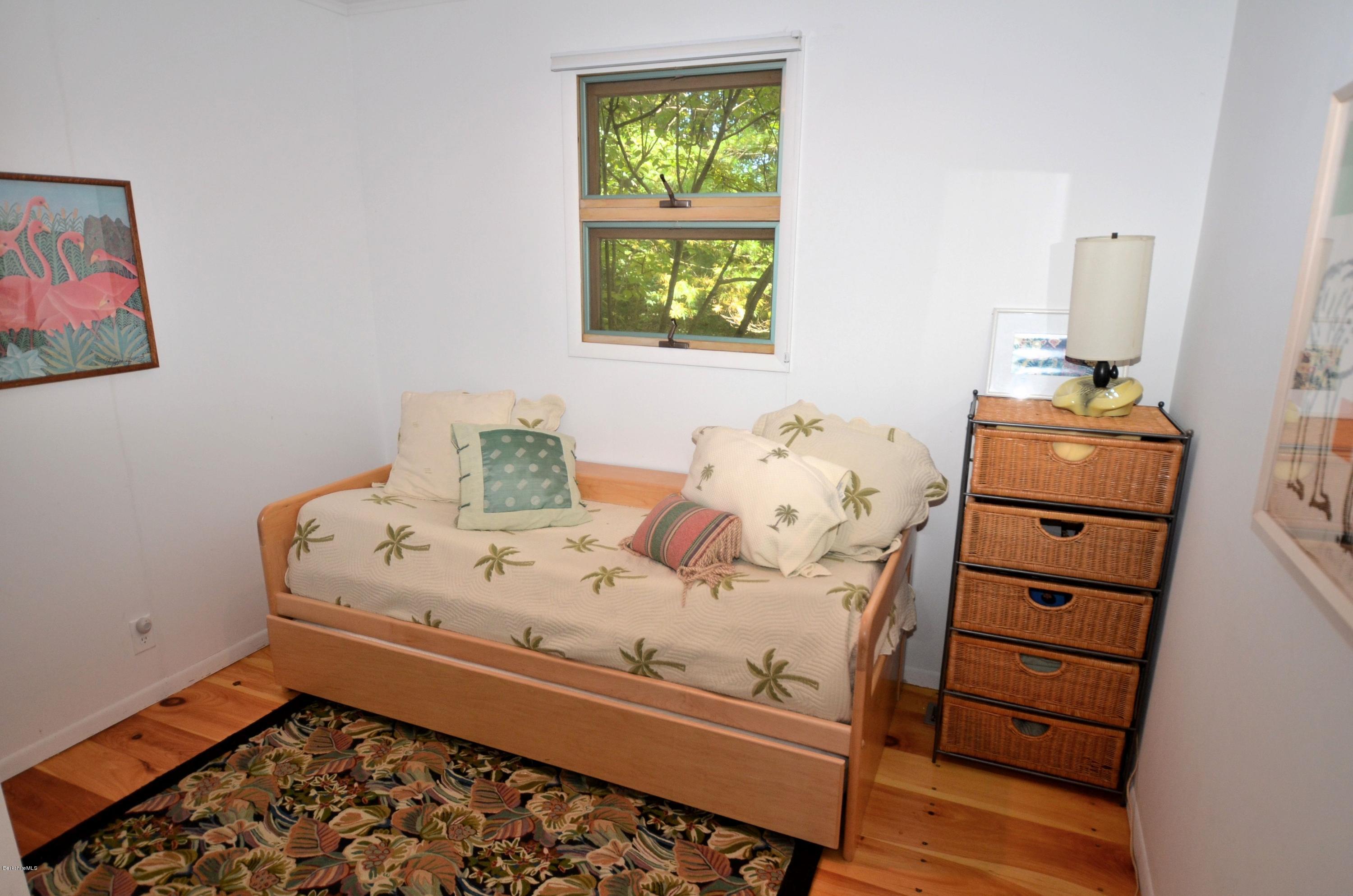 16 Point Road Monterey, MA 01245 - Photo 17 of 18 a bedroom with a bed and a window in it