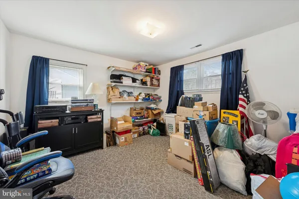 a room with furniture and a flat screen tv