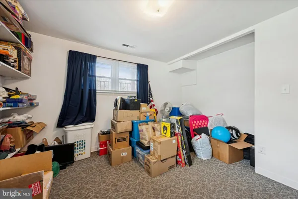 a room with furniture and a flat screen tv