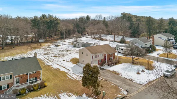a view of a town with mountains in the background