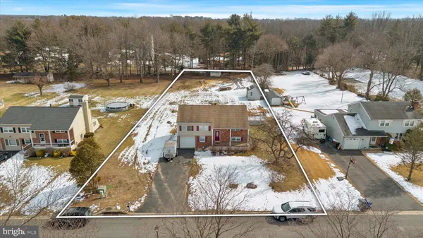 a view of a house with a park